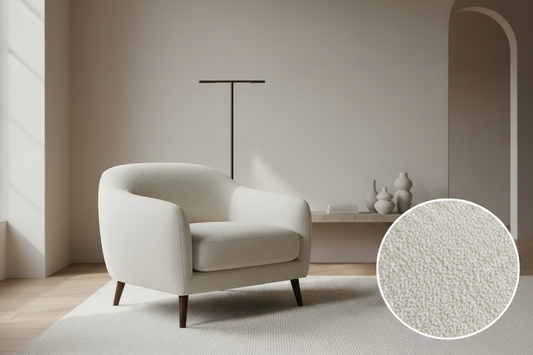 Bouclé upholstery fabric used on a modern armchair